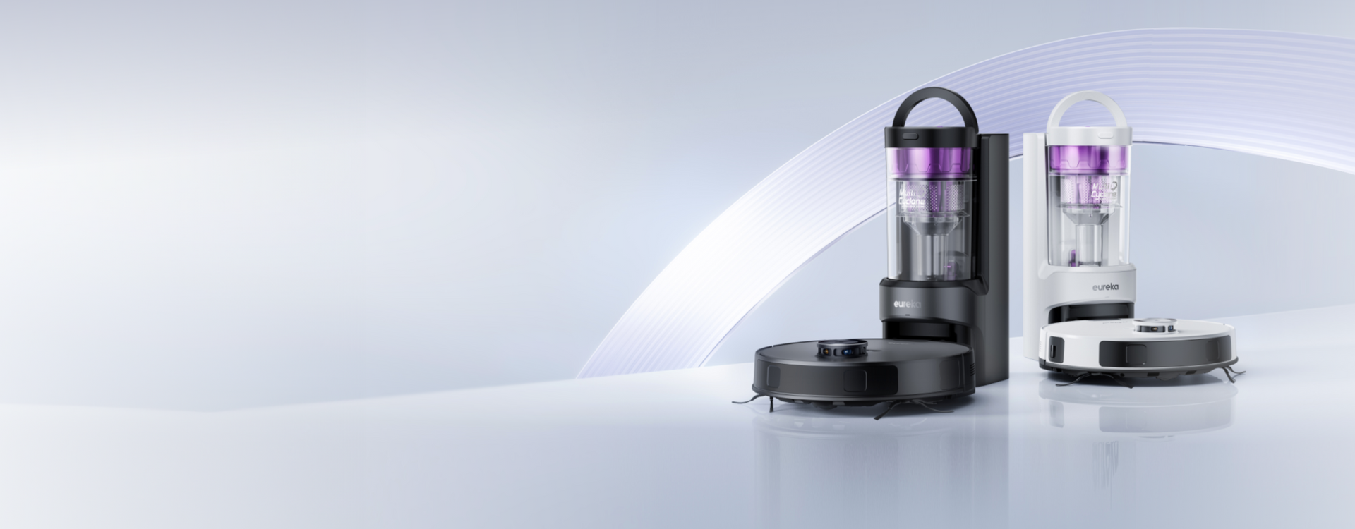 Two black and purple coffee brewing devices on a white background